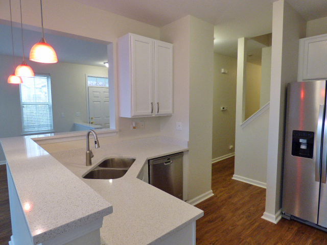 267 Grand Ridge Road St. Charles, IL 60175 - Photo 12 of 41 a kitchen with stainless steel appliances granite countertop a sink a refrigerator and a granite counter tops