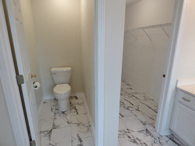 267 Grand Ridge Road St. Charles, IL 60175 - Photo 24 of 41 a bathroom with a toilet and a shower