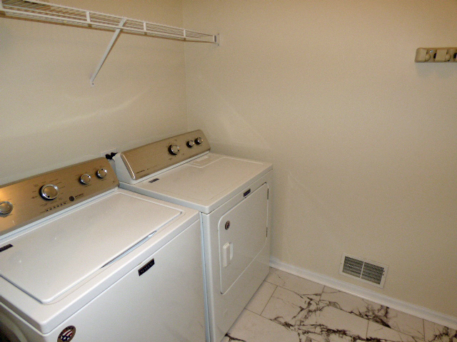 267 Grand Ridge Road St. Charles, IL 60175 - Photo 32 of 41 a utility room with dryer and washer