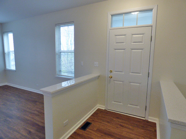 267 Grand Ridge Road St. Charles, IL 60175 - Photo 4 of 41 wooden floor in an empty room with a window