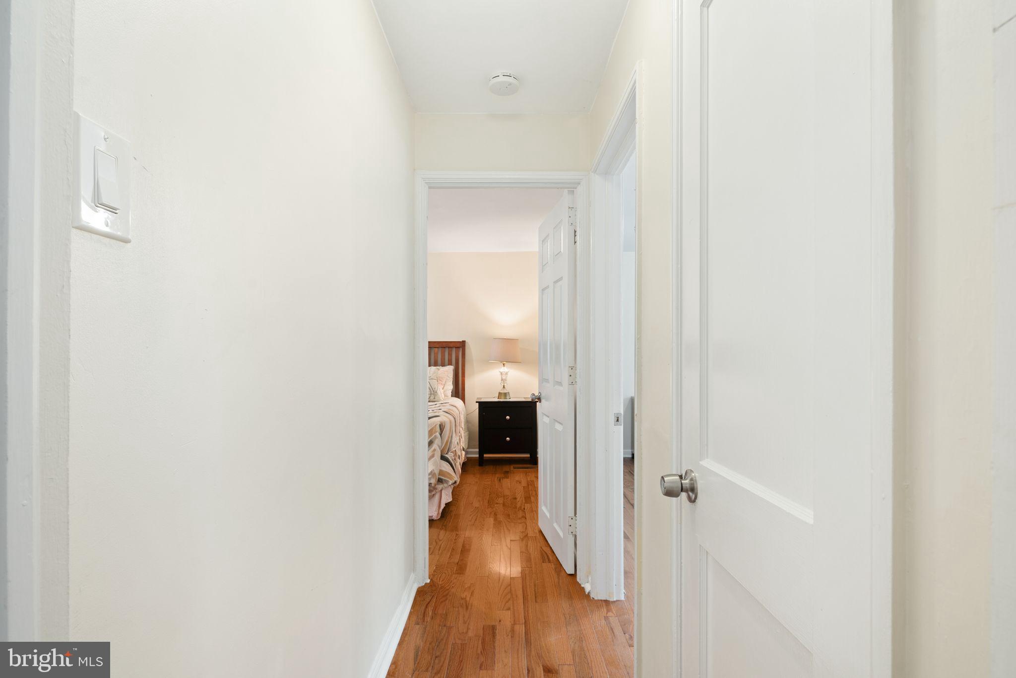 13 Rodney Road Bryn Mawr, PA 19010 - Photo 15 of 42 a view of a bedroom from a hallway