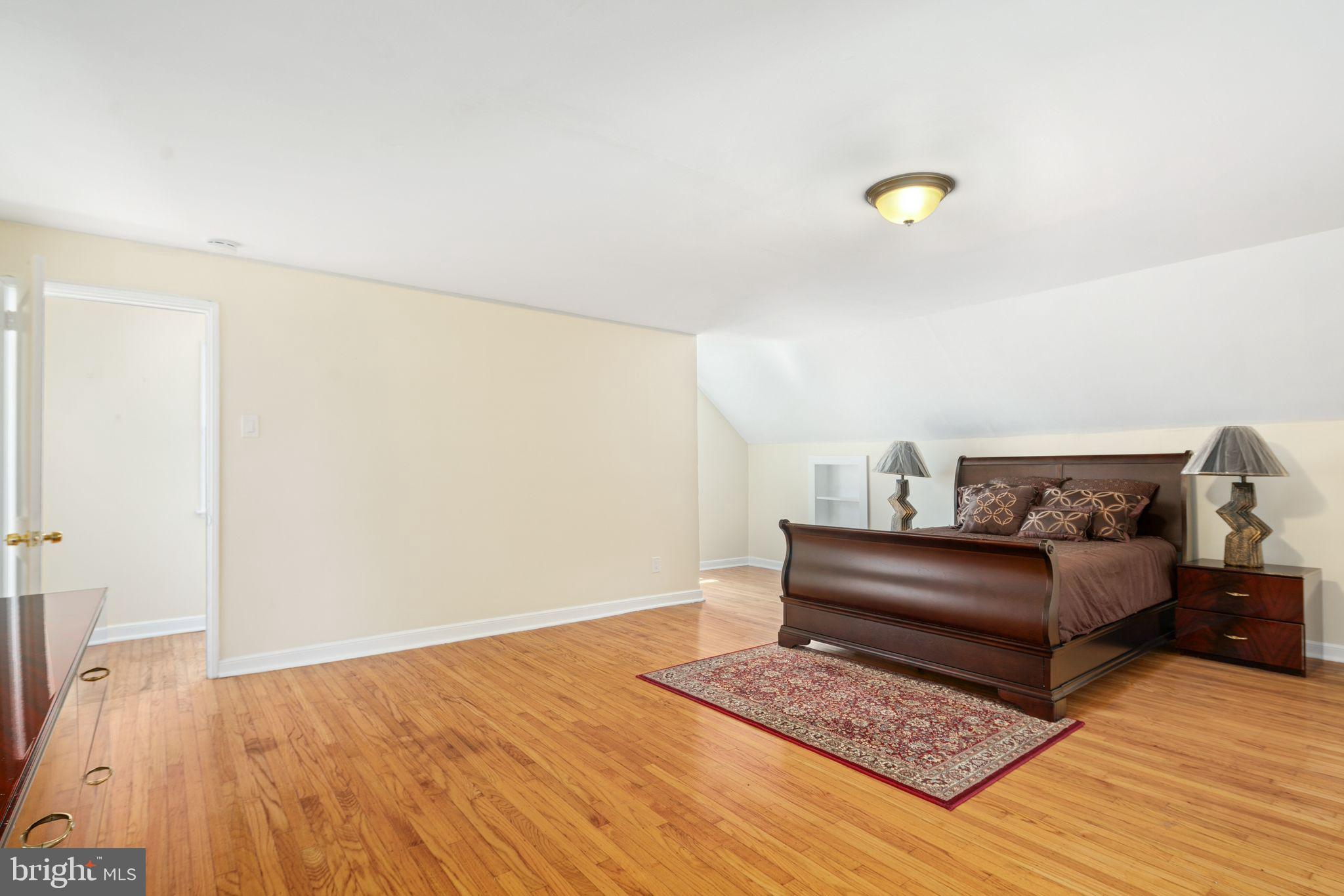 13 Rodney Road Bryn Mawr, PA 19010 - Photo 24 of 42 a living room with furniture and a rug