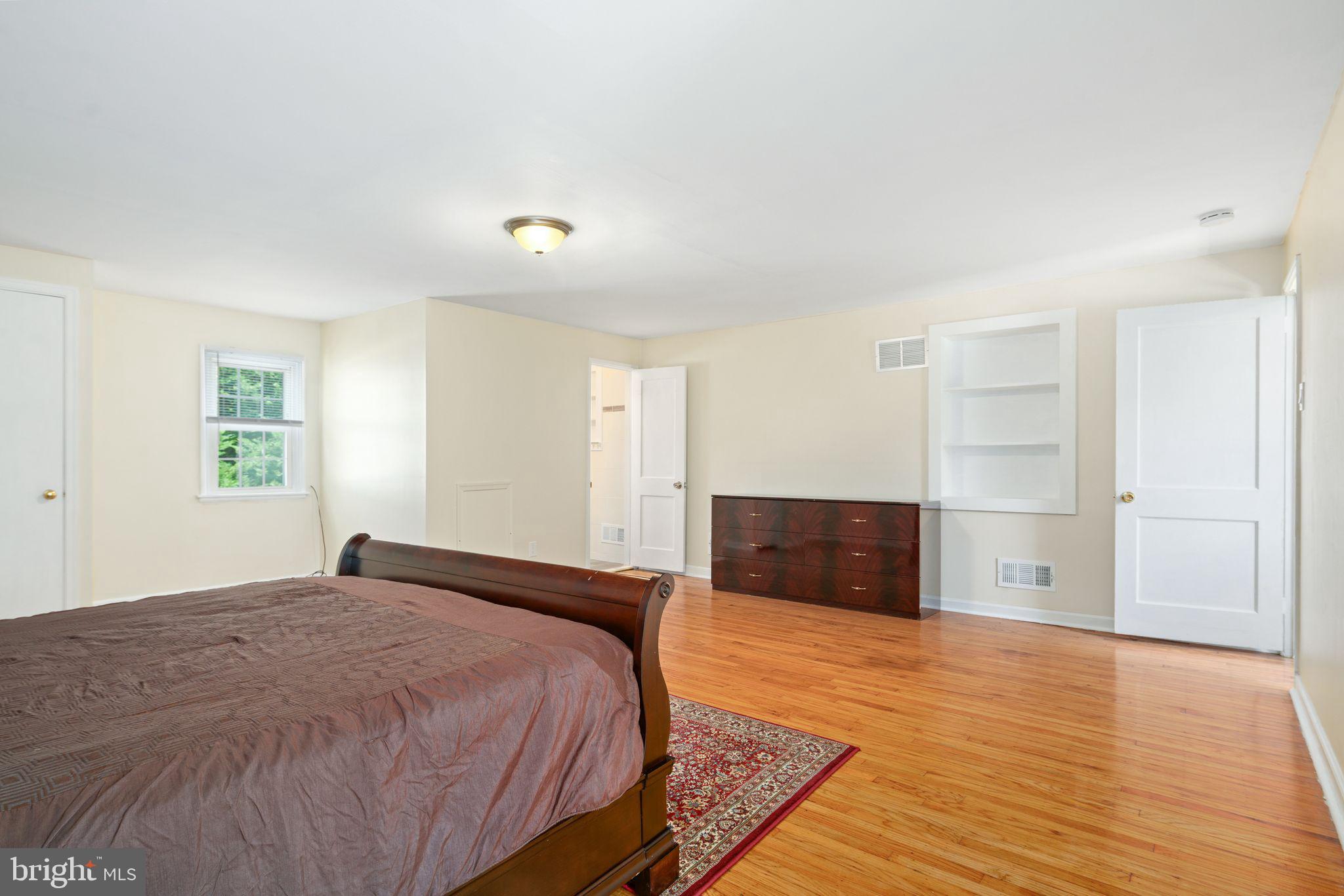 13 Rodney Road Bryn Mawr, PA 19010 - Photo 25 of 42 a bedroom with a bed and a window