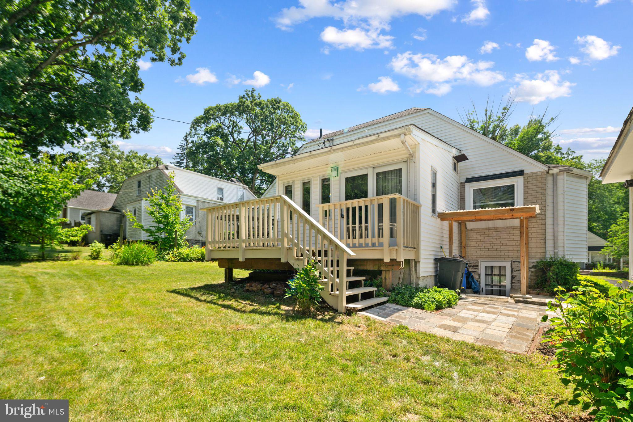 13 Rodney Road Bryn Mawr, PA 19010 - Photo 32 of 42 a front view of a house with a yard