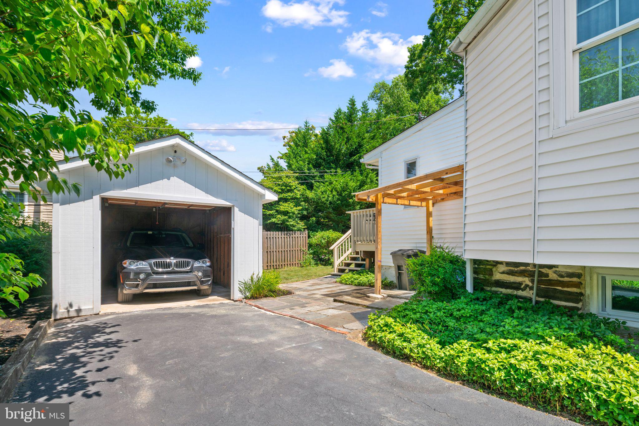 13 Rodney Road Bryn Mawr, PA 19010 - Photo 34 of 42 a view of a terrace with a garden and plants