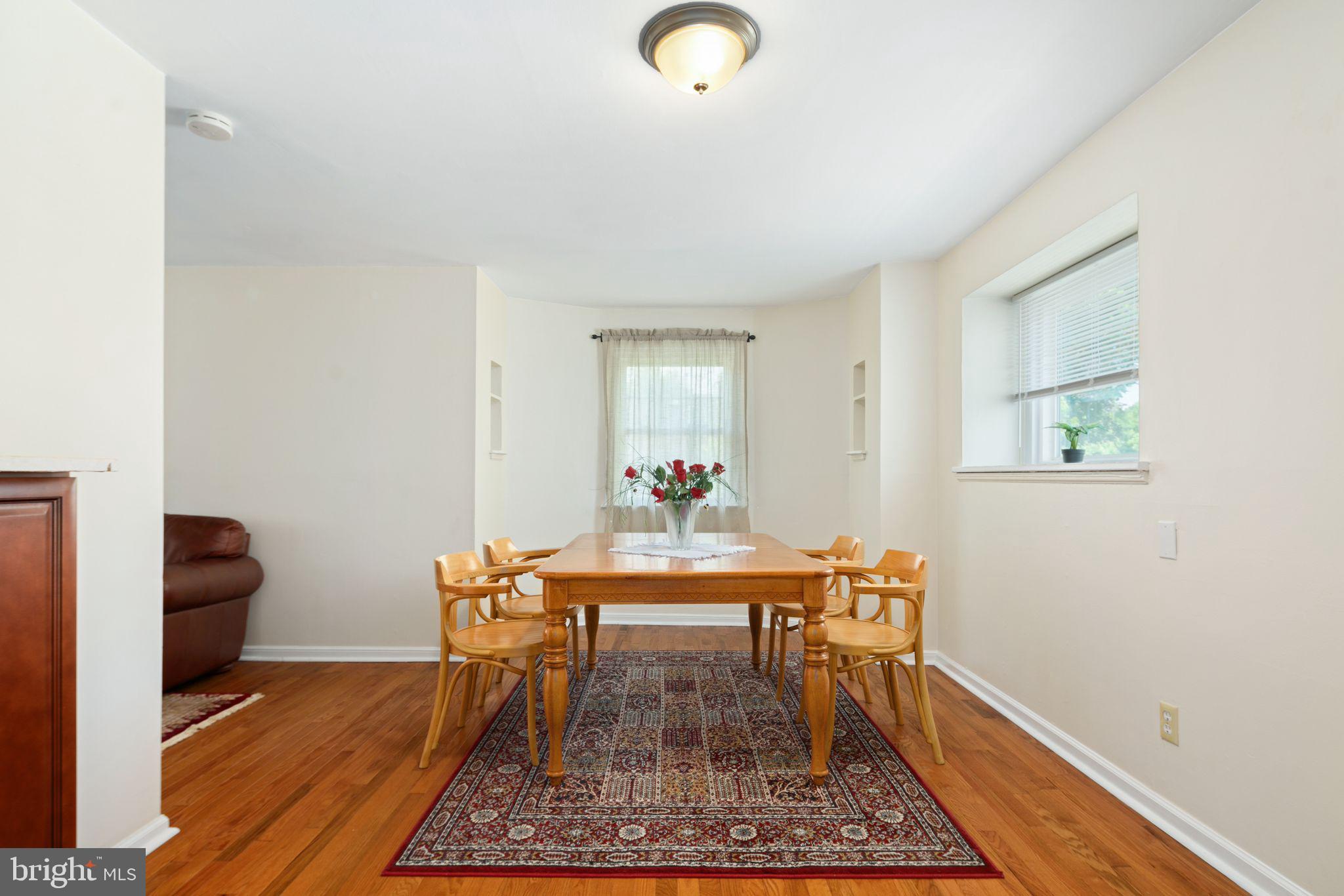 13 Rodney Road Bryn Mawr, PA 19010 - Photo 7 of 42 a dining room with table and a rug
