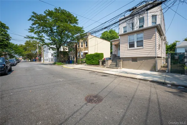 a view of a house with a street