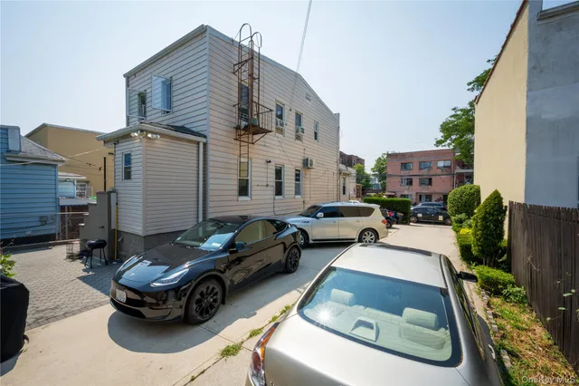 a car parked in front of a house