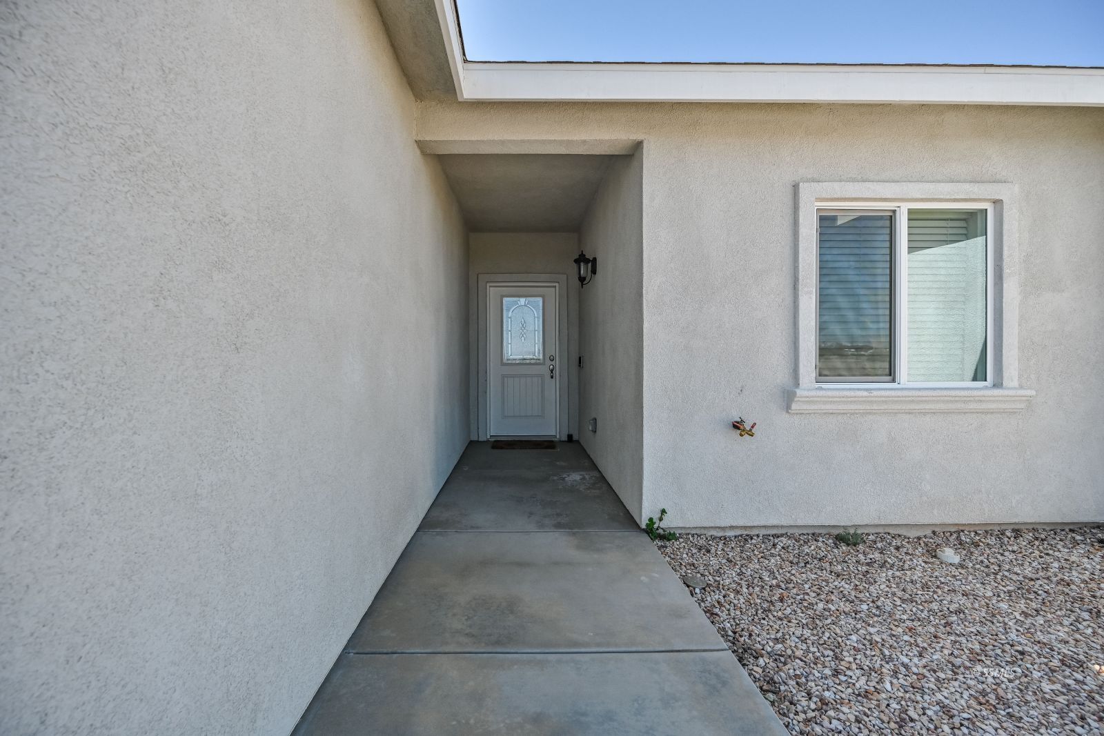 1031 West Church Avenue Ridgecrest, CA 93555 - Photo 4 of 49 a view of a house with a door