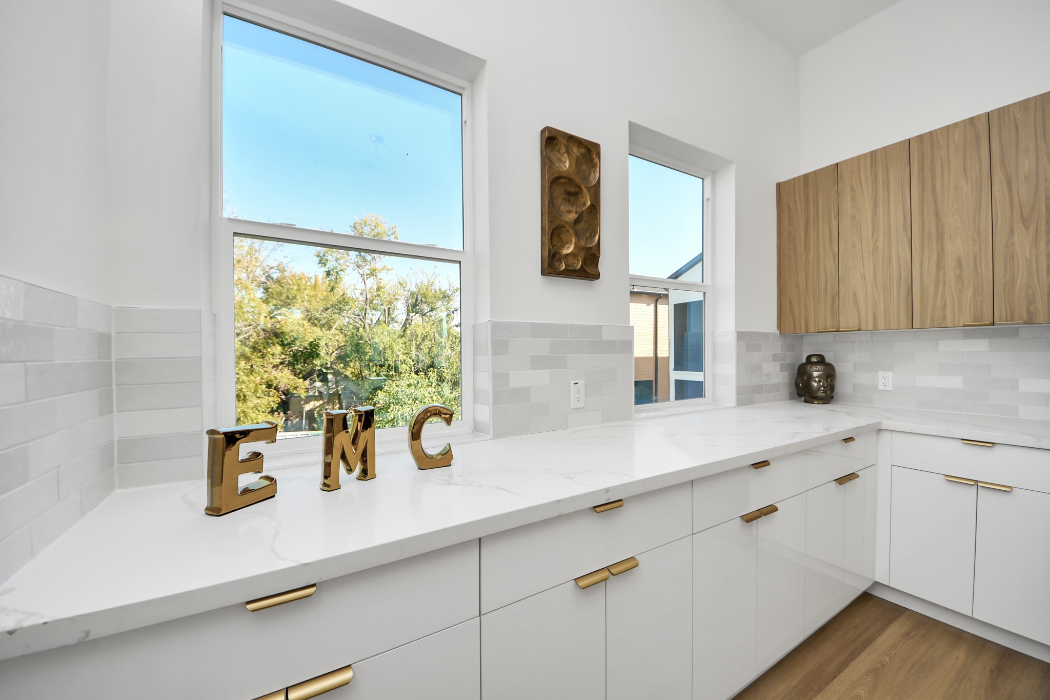 1216 East 34th Street, Unit B Houston, TX 77022 - Photo 18 of 42 a kitchen with a sink and a window