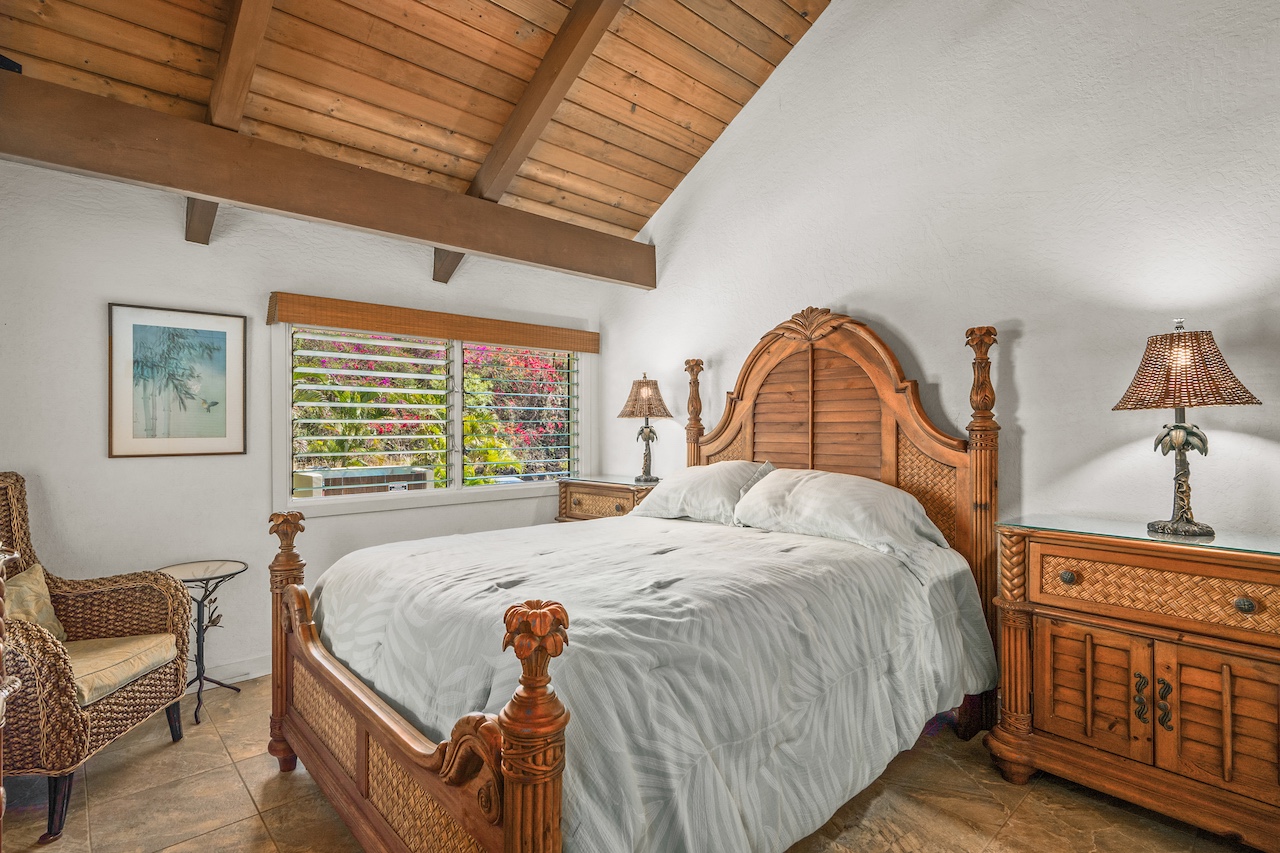 2330 Ho'ohu Road, Unit 5 Koloa, HI 96756 - Photo 13 of 28 a bedroom with a bed next to a window with outer view