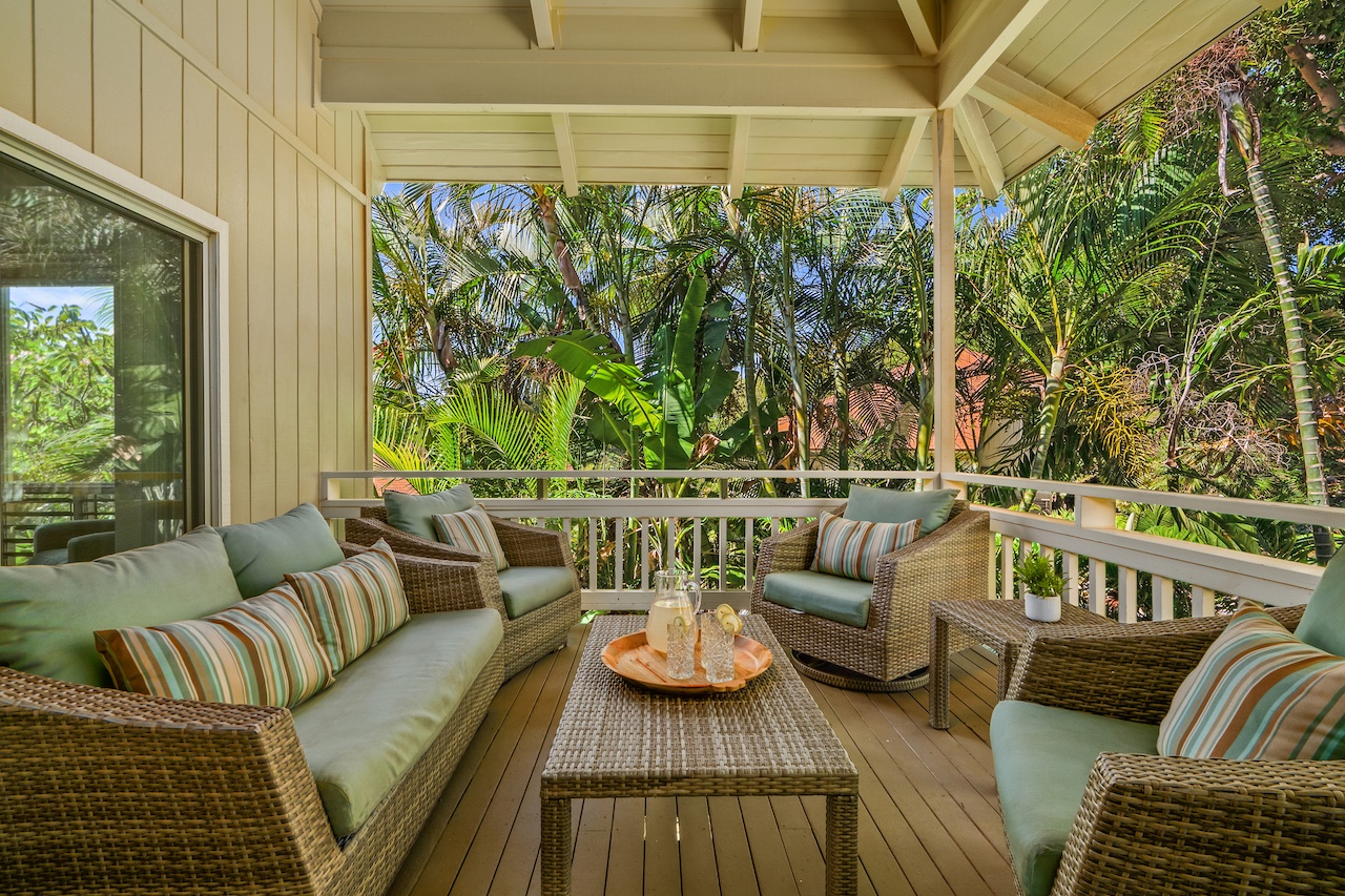 2330 Ho'ohu Road, Unit 5 Koloa, HI 96756 - Photo 2 of 28 a balcony with couch and outdoor view