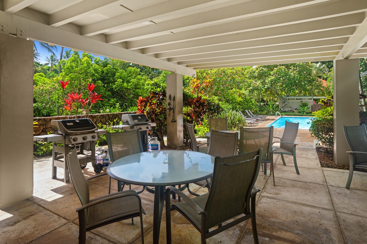 2330 Ho'ohu Road, Unit 5 Koloa, HI 96756 - Photo 24 of 28 a view of a dining room with furniture window and outside view