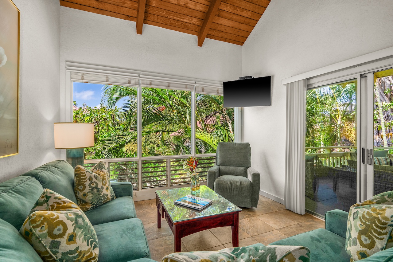 2330 Ho'ohu Road, Unit 5 Koloa, HI 96756 - Photo 3 of 28 a living room with furniture and a large window