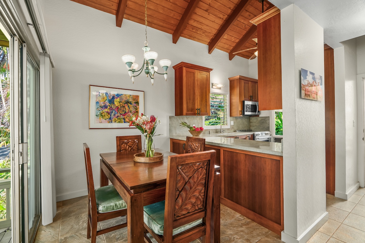 2330 Ho'ohu Road, Unit 5 Koloa, HI 96756 - Photo 8 of 28 a view of a dining room with furniture