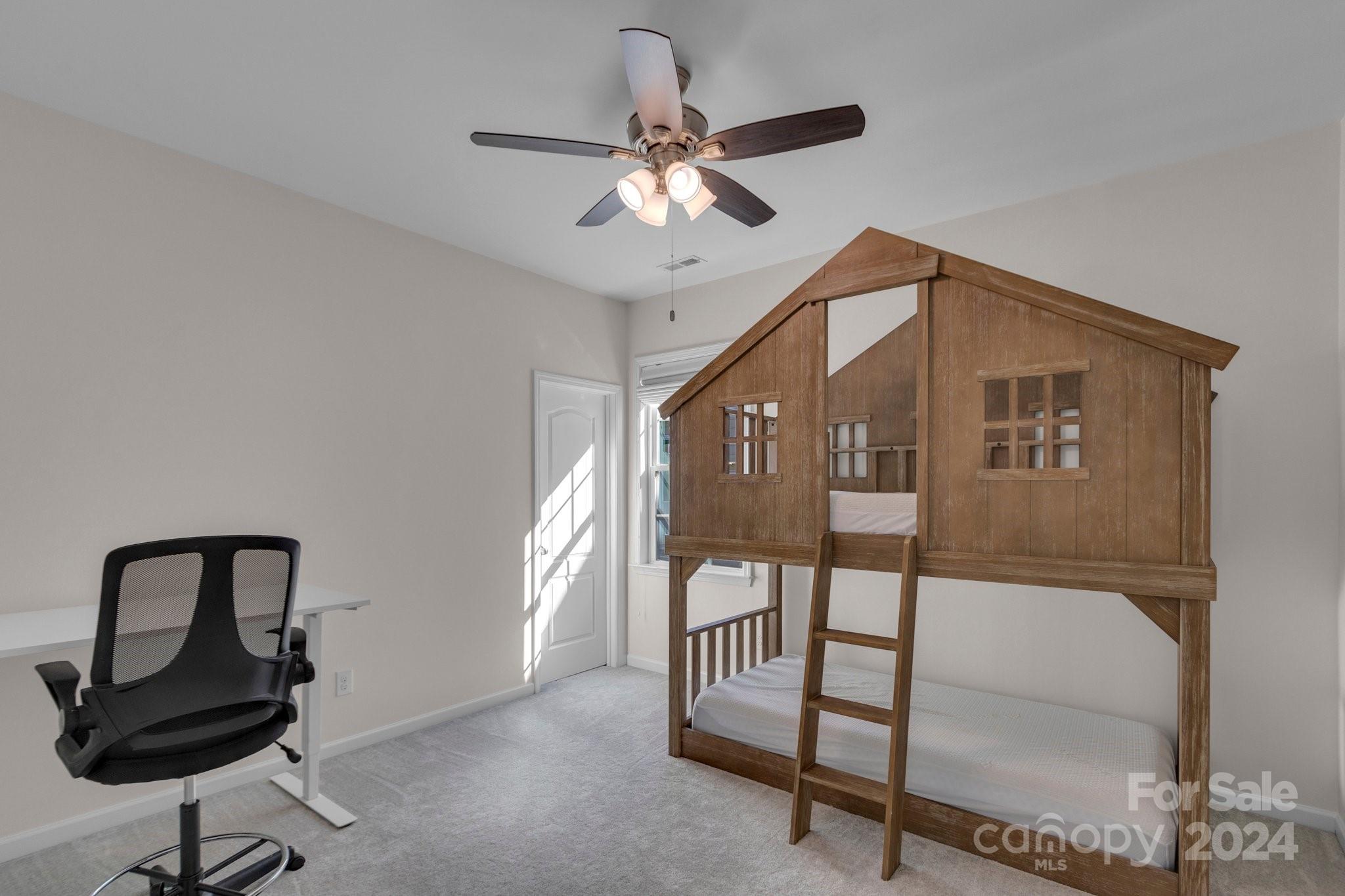 4095 Whittier Lane Fort Mill, SC 29708 - Photo 14 of 30 a very nice looking room with a ceiling fan