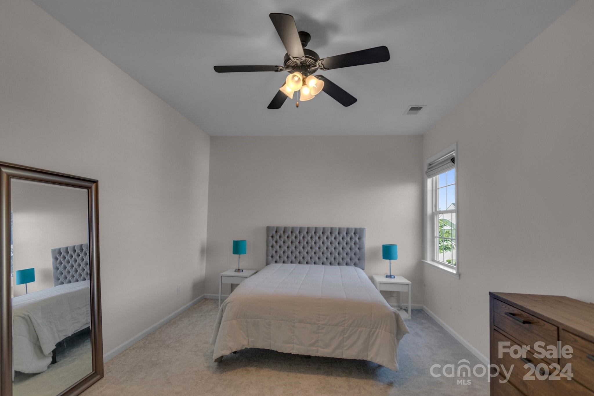 4095 Whittier Lane Fort Mill, SC 29708 - Photo 16 of 30 a bedroom with a bed and a window