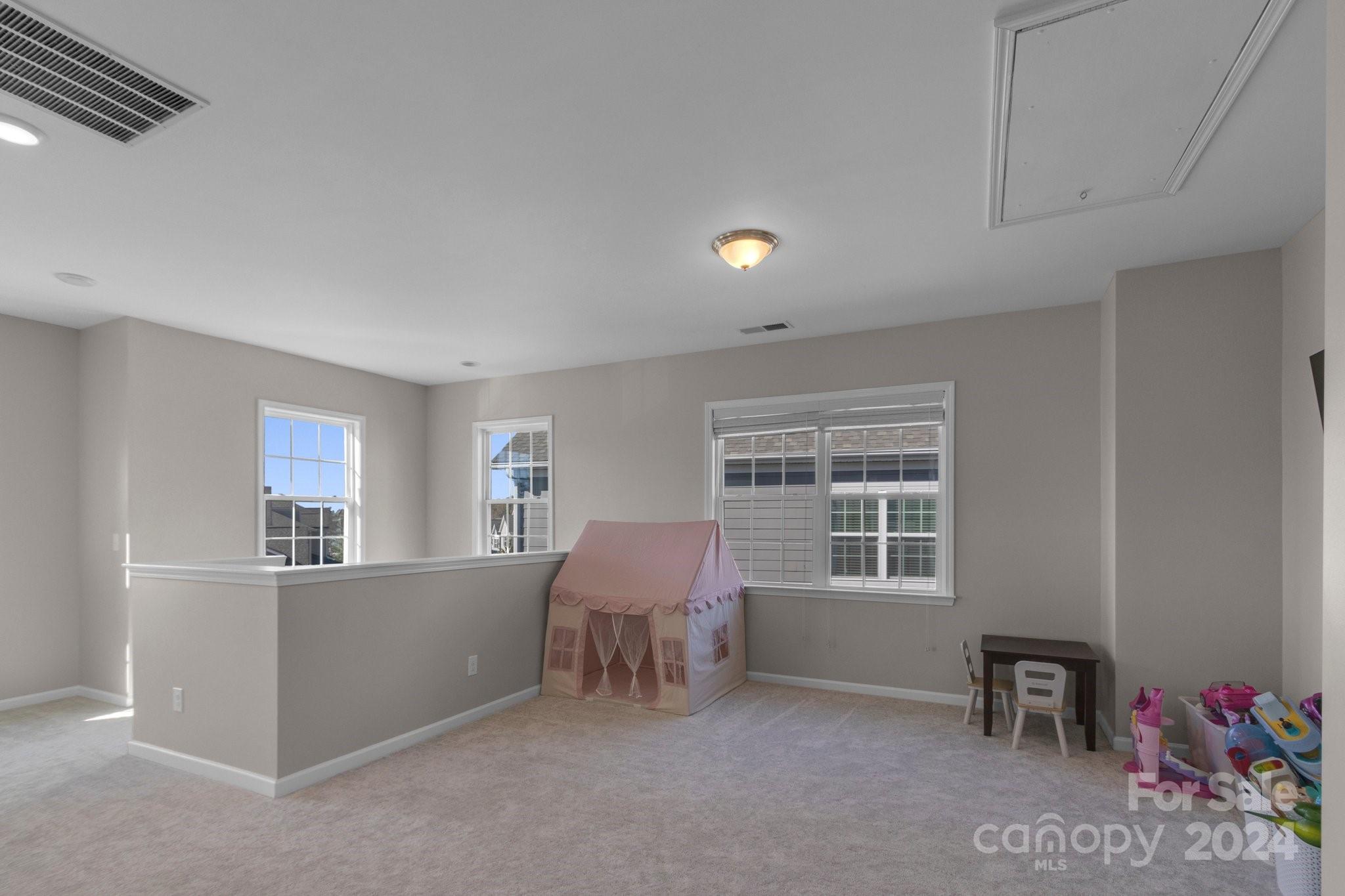 4095 Whittier Lane Fort Mill, SC 29708 - Photo 17 of 30 a living room with furniture and a window