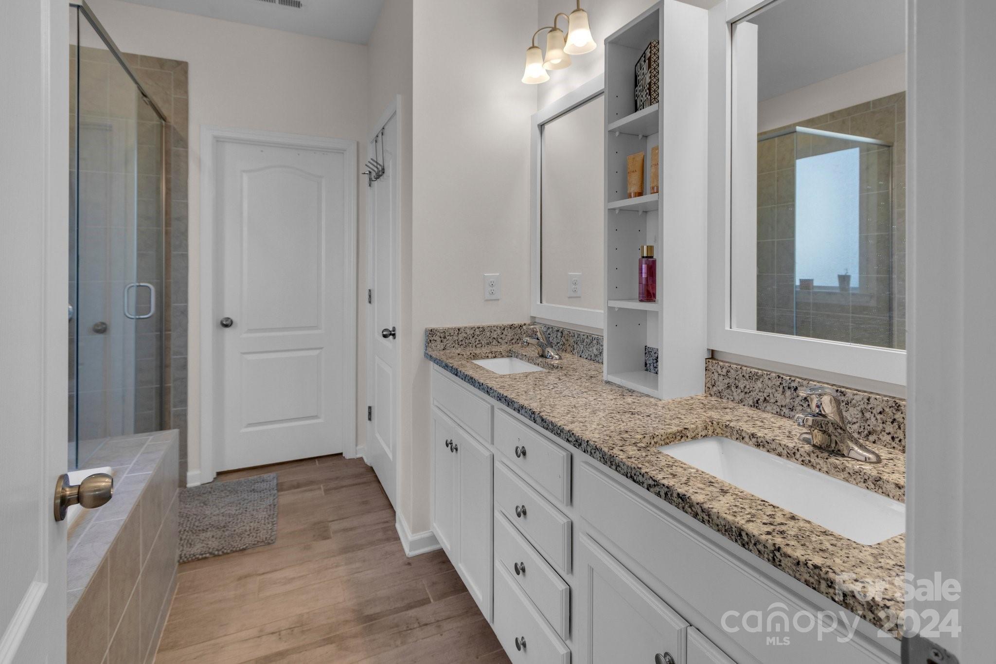 4095 Whittier Lane Fort Mill, SC 29708 - Photo 18 of 30 a bathroom with a granite countertop double vanity sink and mirror