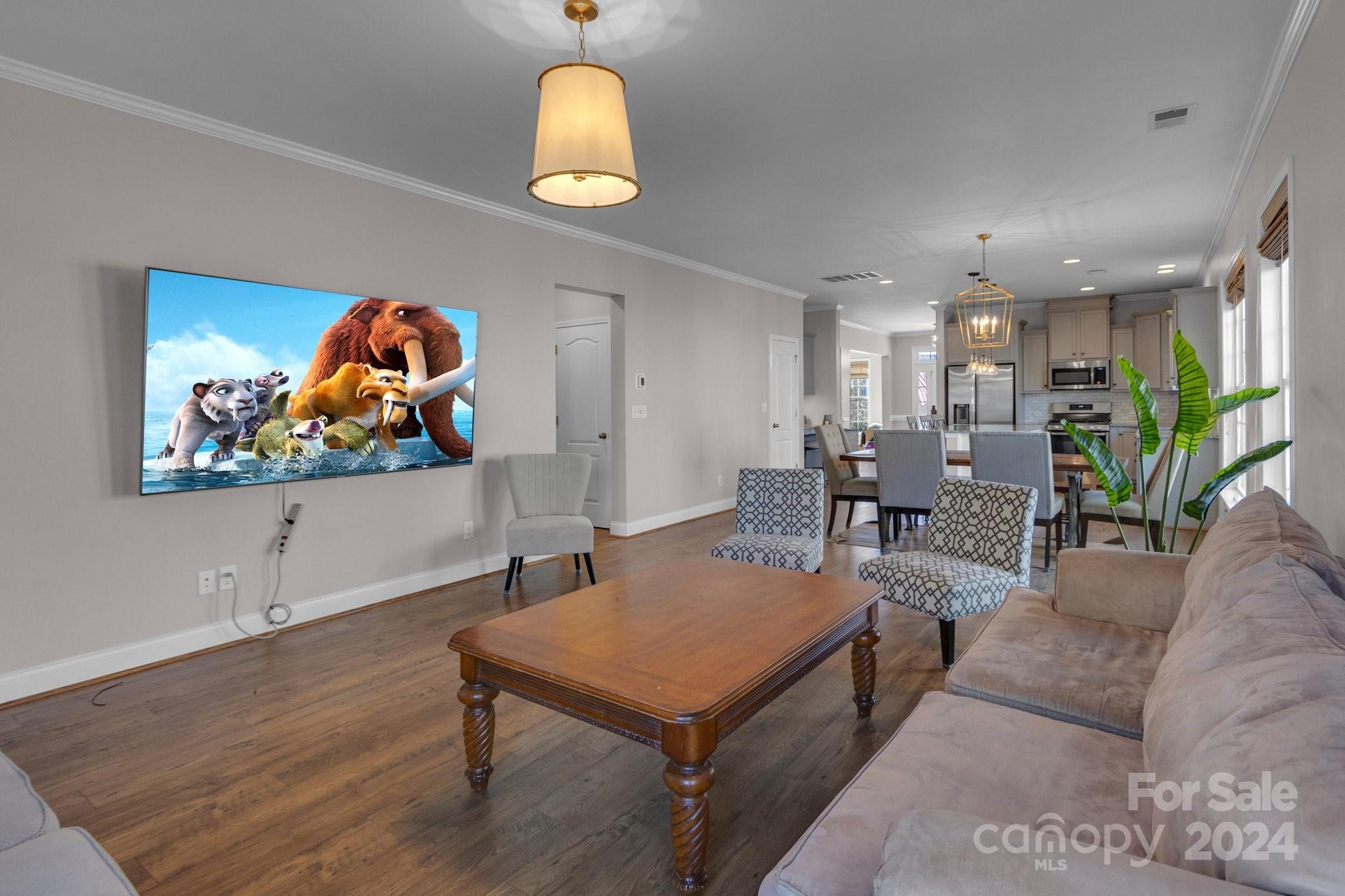 4095 Whittier Lane Fort Mill, SC 29708 - Photo 23 of 30 a living room with furniture and a flat screen tv