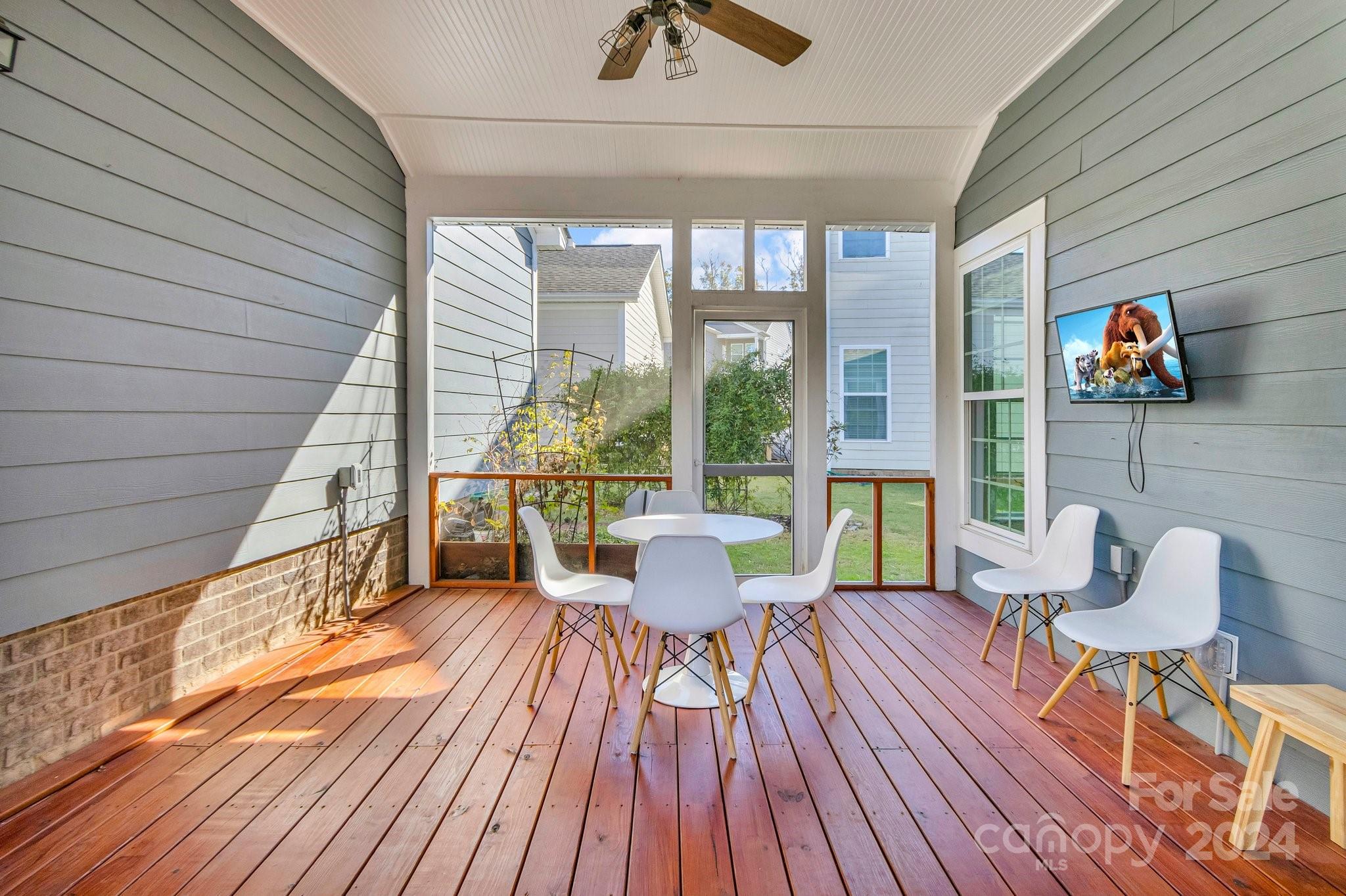 4095 Whittier Lane Fort Mill, SC 29708 - Photo 24 of 30 a balcony with wooden floor and outdoor seating