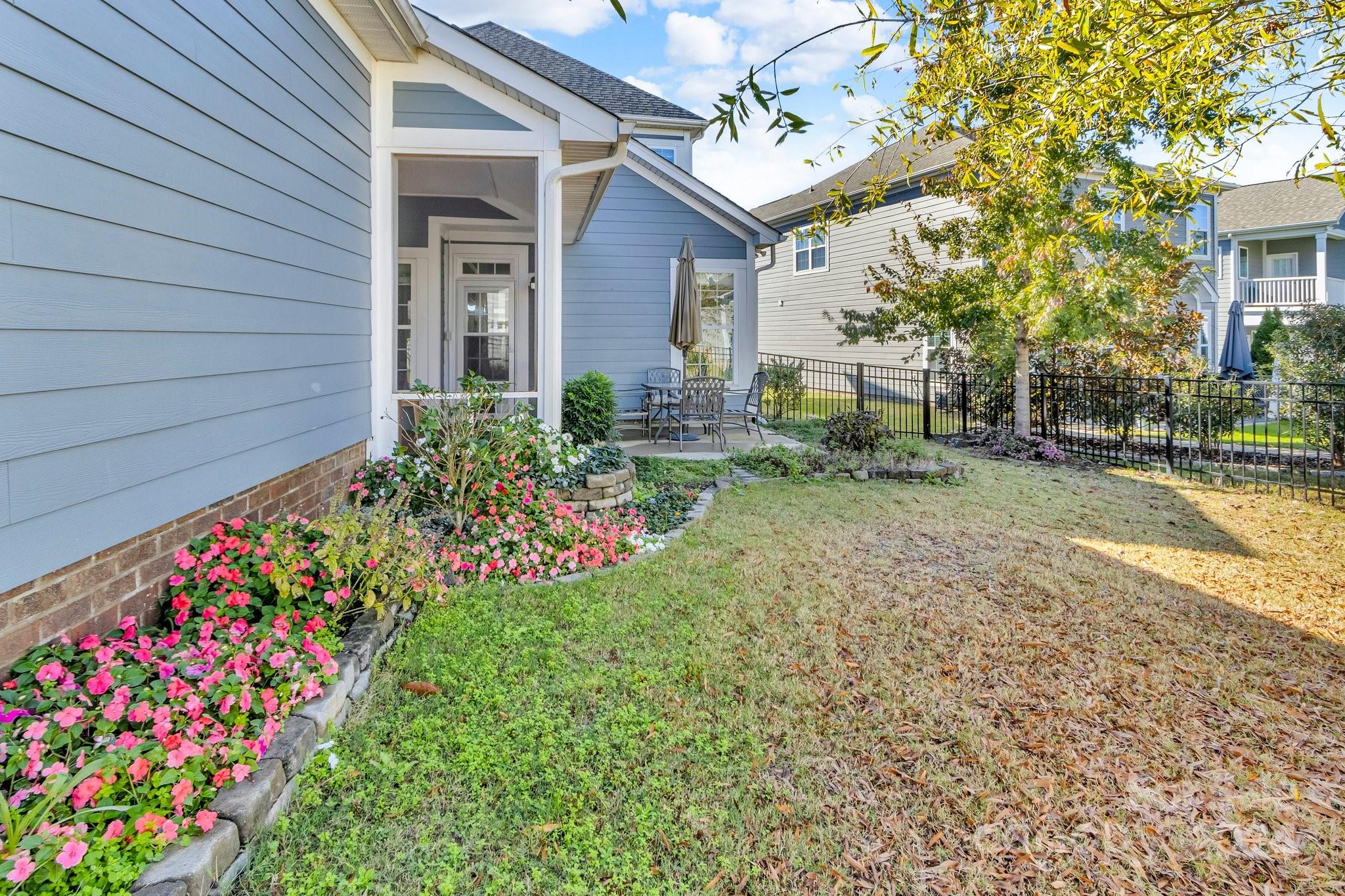 4095 Whittier Lane Fort Mill, SC 29708 - Photo 27 of 30 a view of a house with a garden