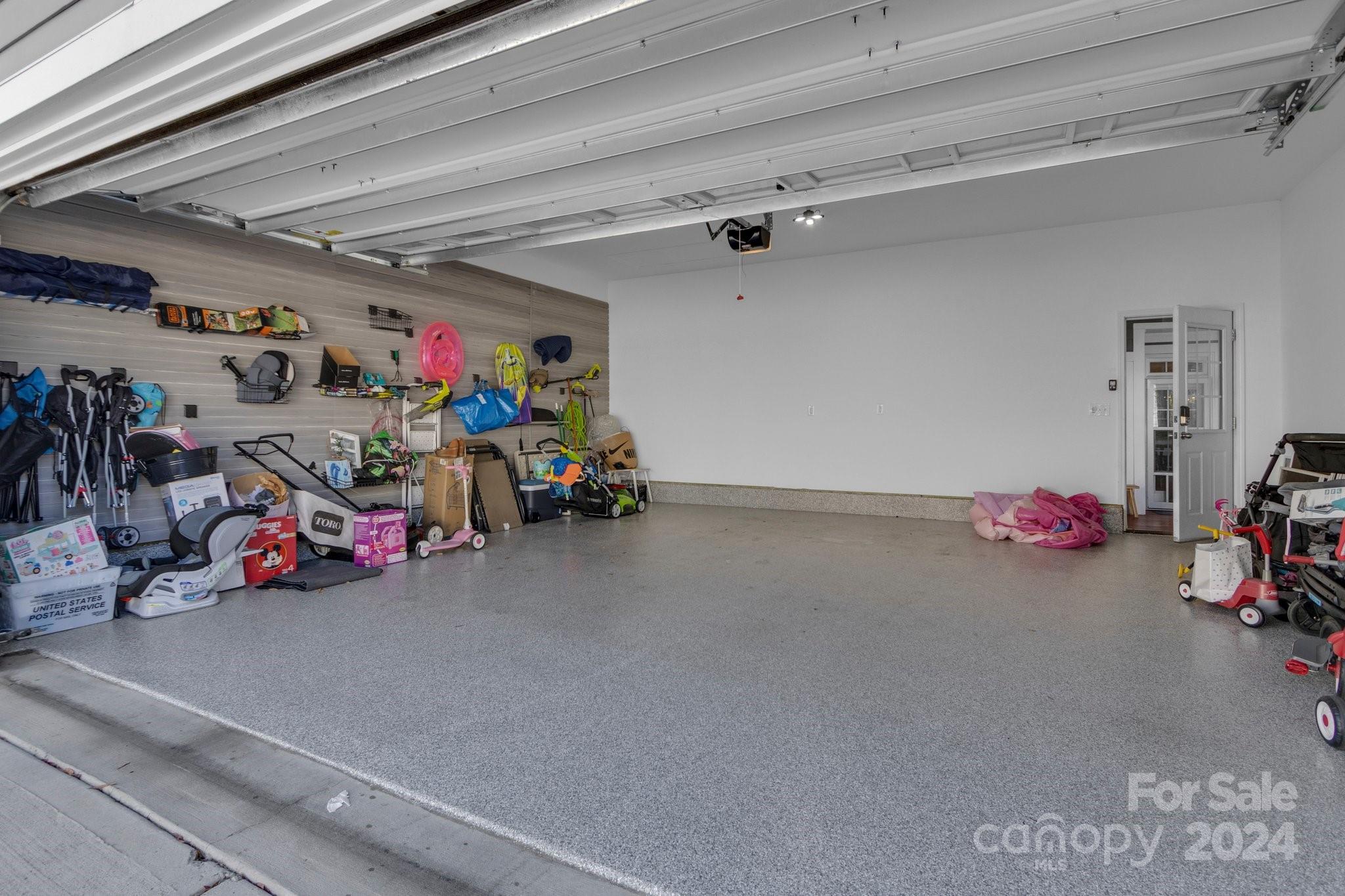 4095 Whittier Lane Fort Mill, SC 29708 - Photo 29 of 30 a view of a garage with a bike and a garage