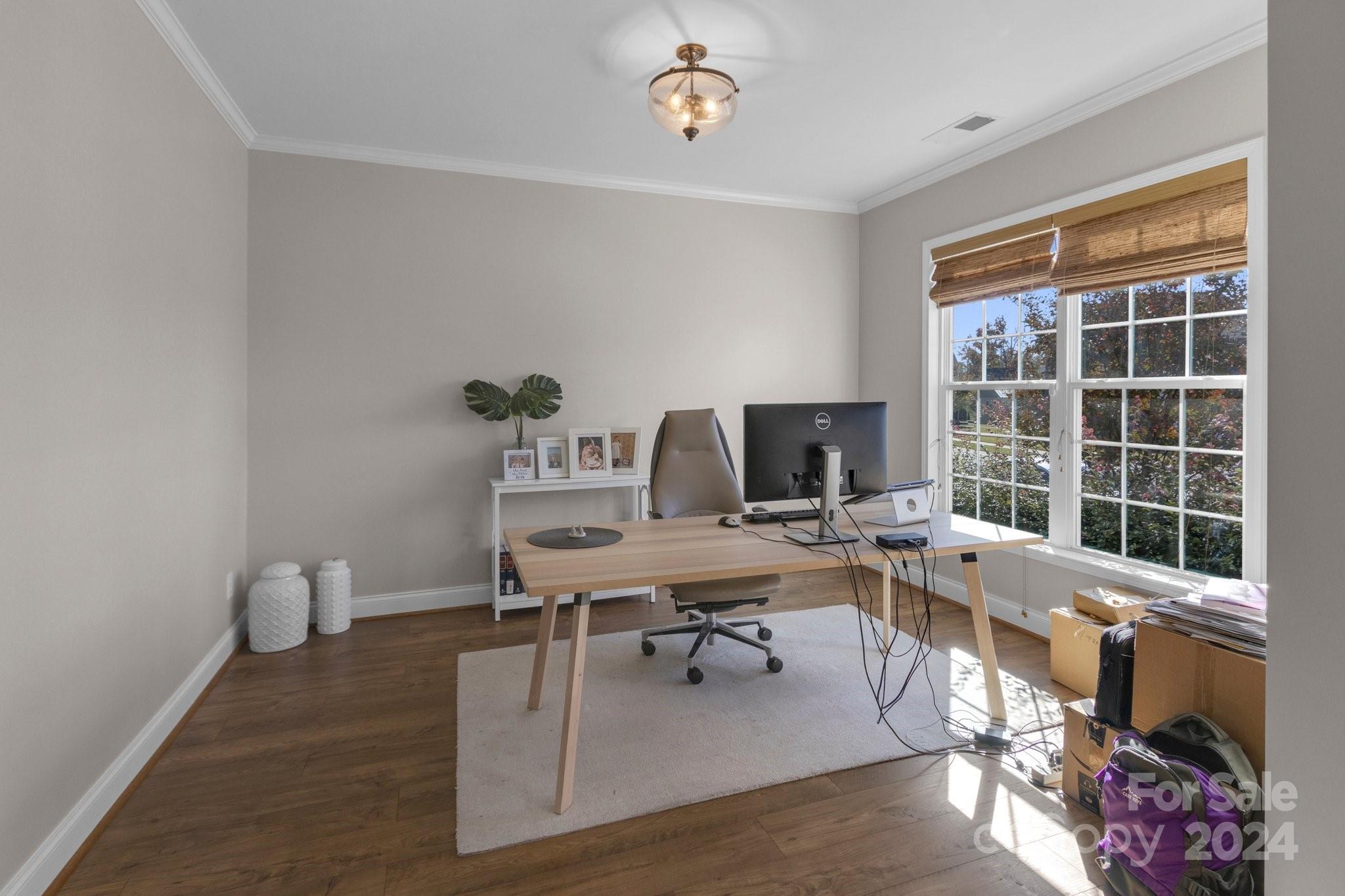 4095 Whittier Lane Fort Mill, SC 29708 - Photo 3 of 30 a view of a workspace with furniture and a window
