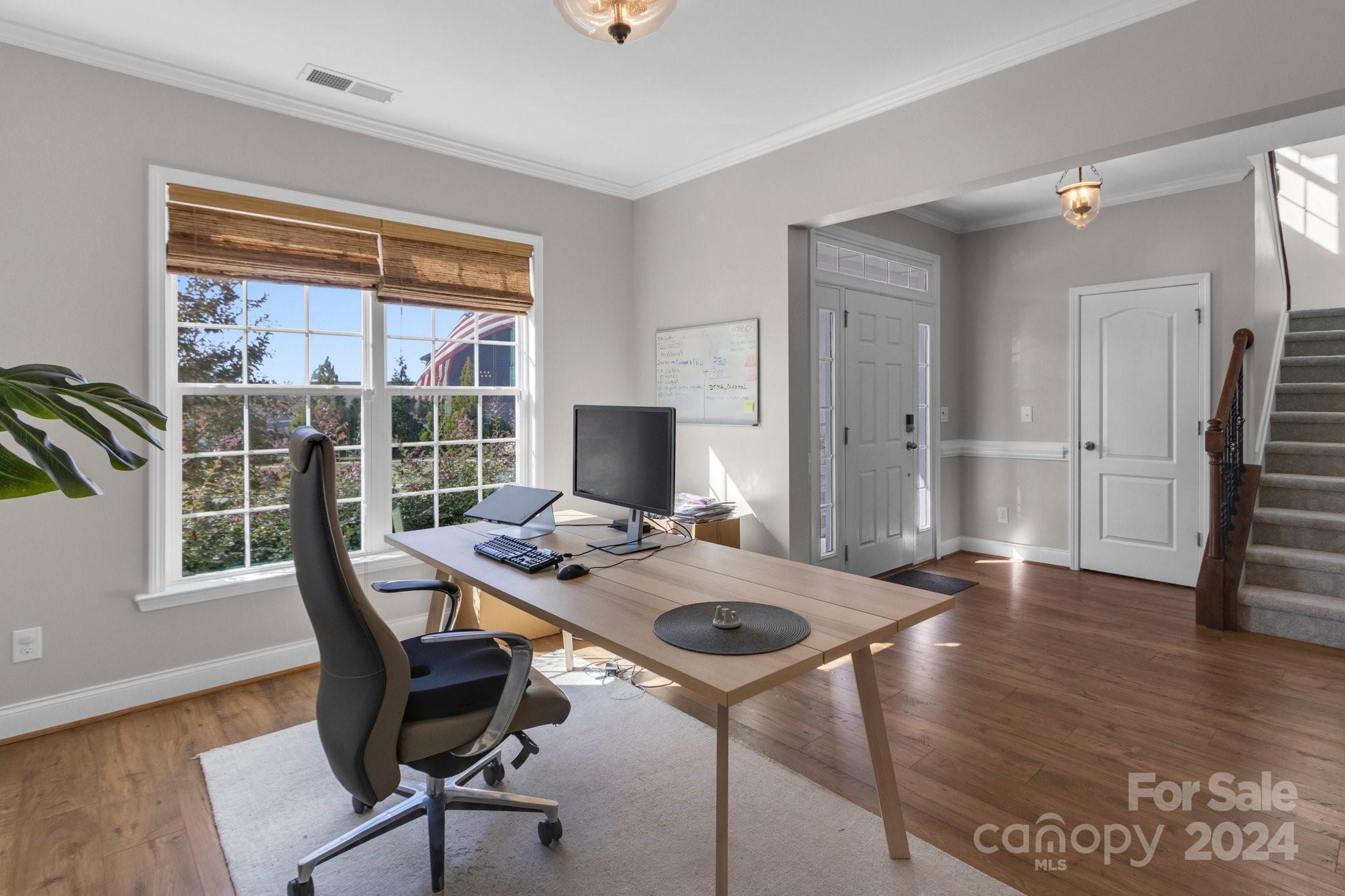 4095 Whittier Lane Fort Mill, SC 29708 - Photo 4 of 30 a view of a workspace with furniture and a window
