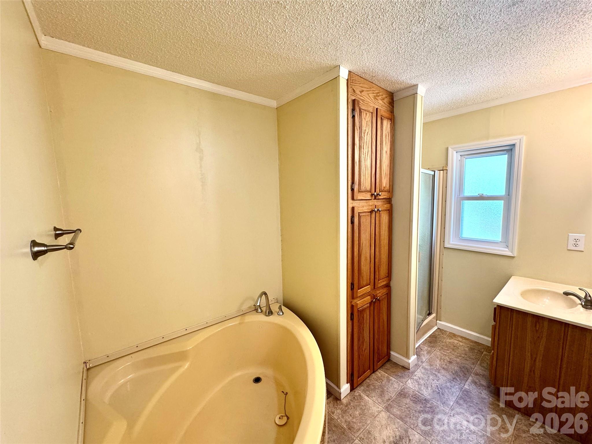 942 Fisher Branch Road Marshall, NC 28753 - Photo 18 of 38 a bathroom with a tub and shower