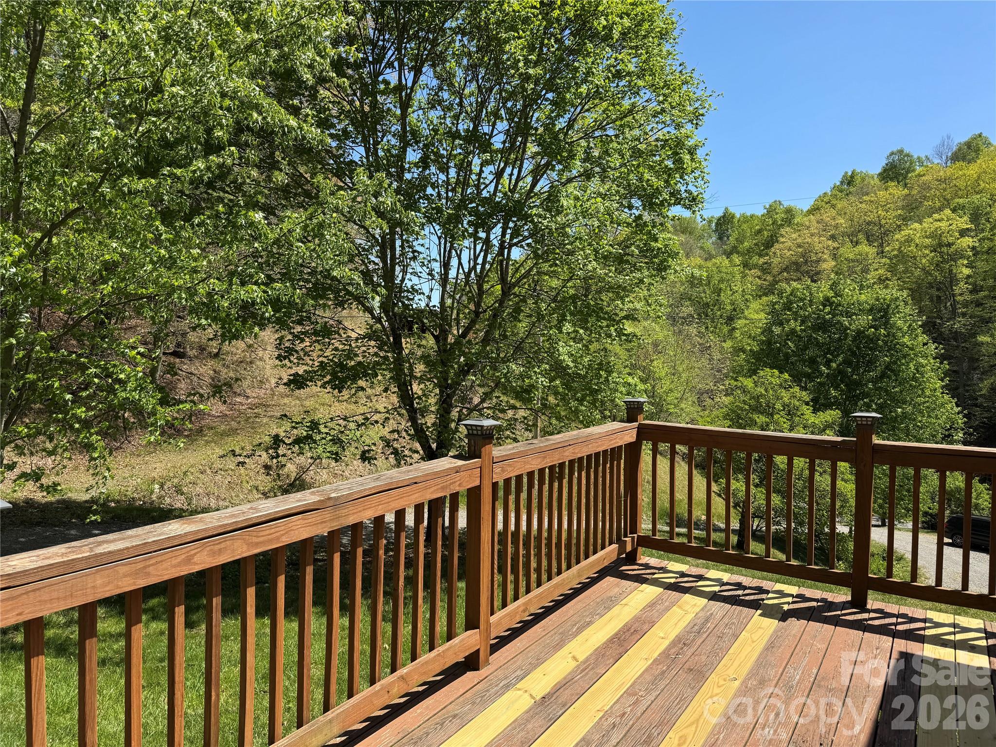 942 Fisher Branch Road Marshall, NC 28753 - Photo 20 of 38 a view of balcony with wooden floor