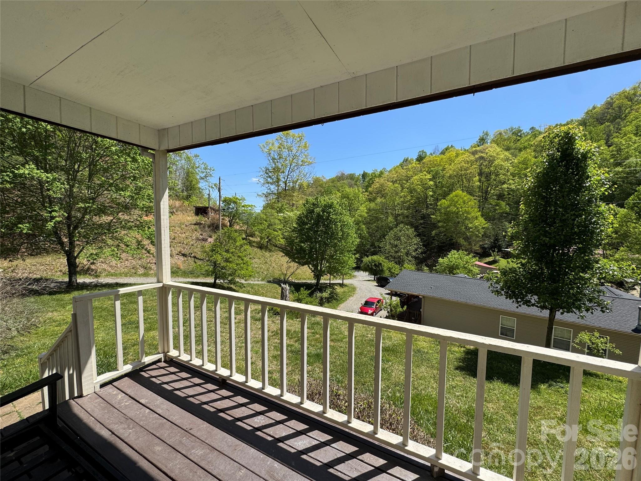 942 Fisher Branch Road Marshall, NC 28753 - Photo 21 of 38 a view of a balcony with lake view