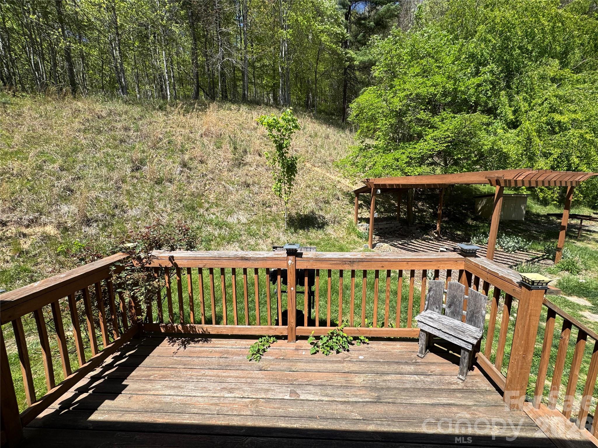 942 Fisher Branch Road Marshall, NC 28753 - Photo 22 of 38 a view of balcony with wooden floor
