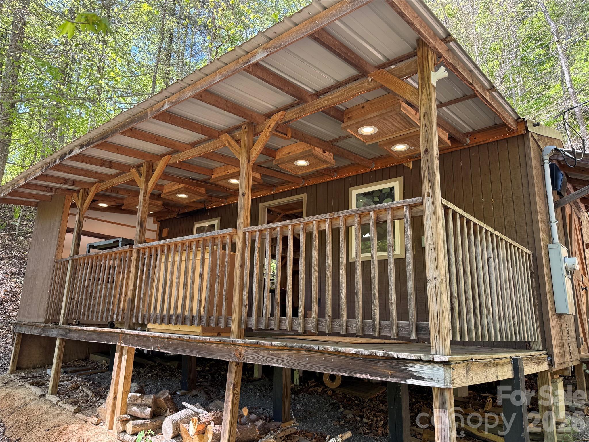 942 Fisher Branch Road Marshall, NC 28753 - Photo 31 of 38 a view of balcony with wooden floor