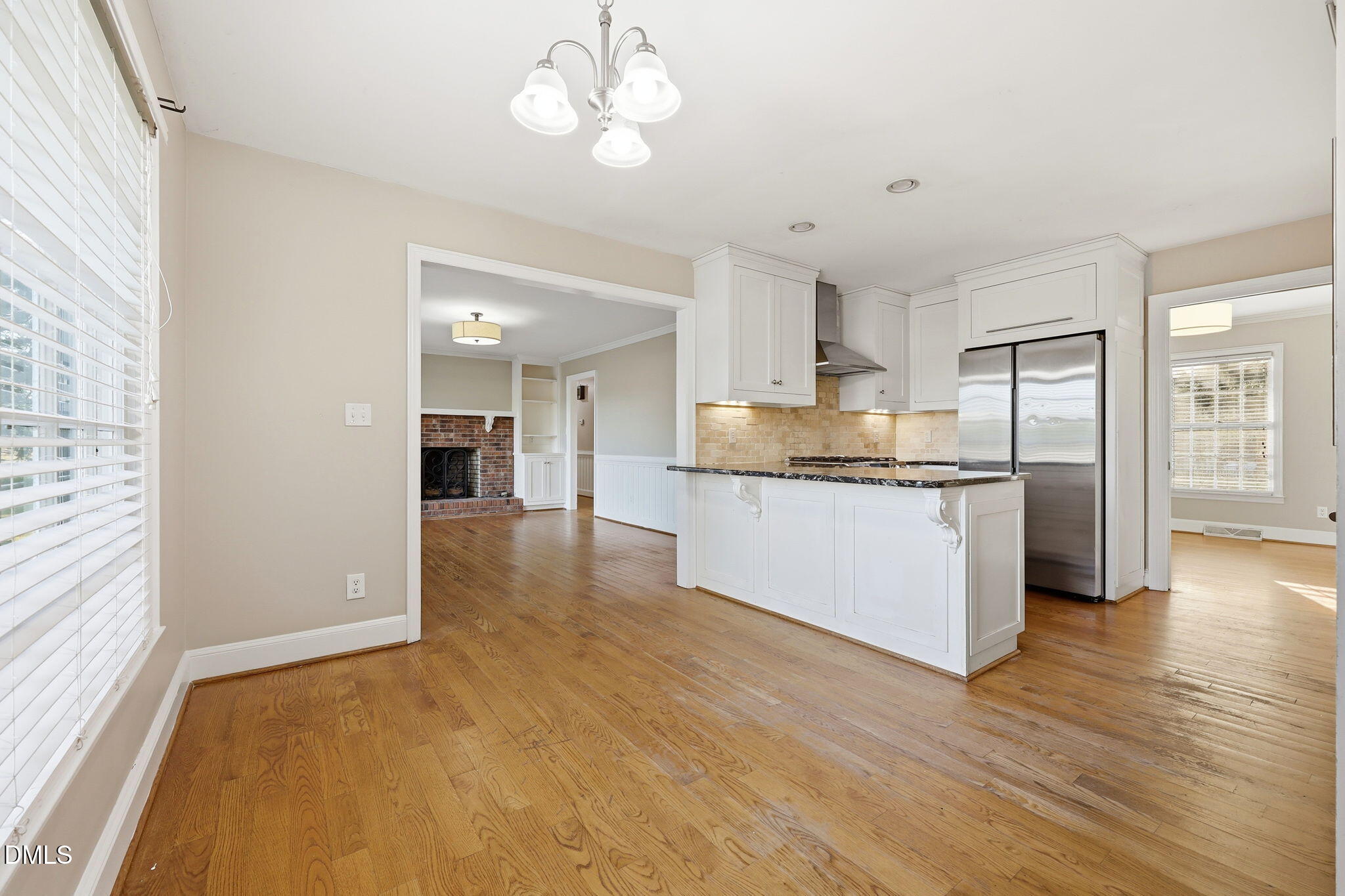 1130 Prospect Church Road Dunn, NC 28334 - Photo 17 of 47 a view of a kitchen with wooden floor and a window