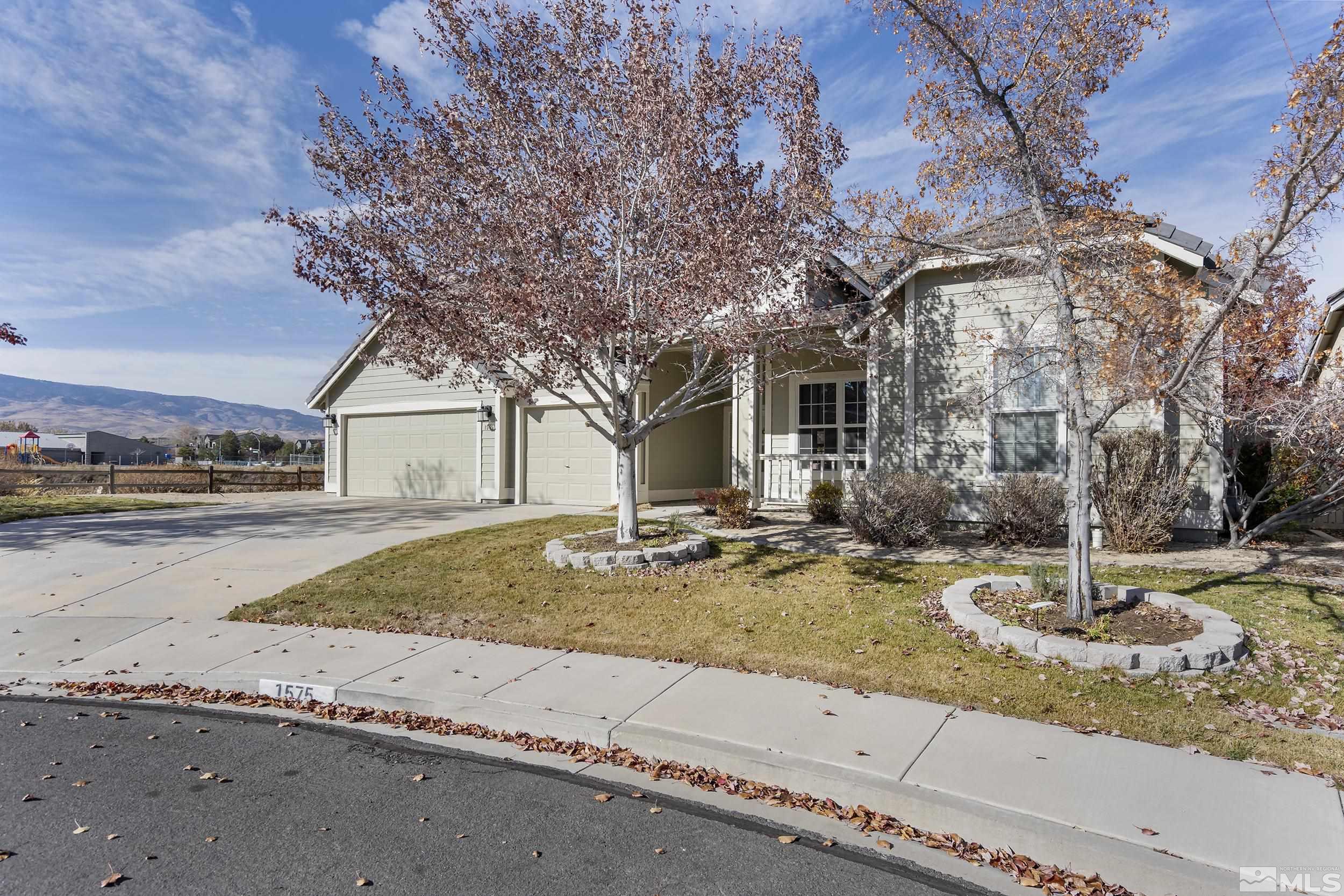 1575 Wyatt Court Reno, NV 89521 - Photo 2 of 40 a front view of a house with garden