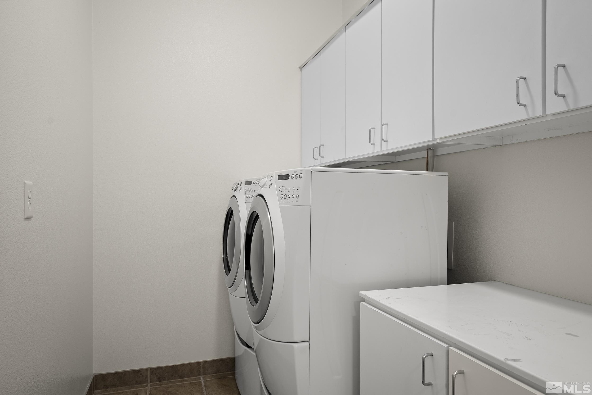 1575 Wyatt Court Reno, NV 89521 - Photo 24 of 40 a utility room with dryer and washer