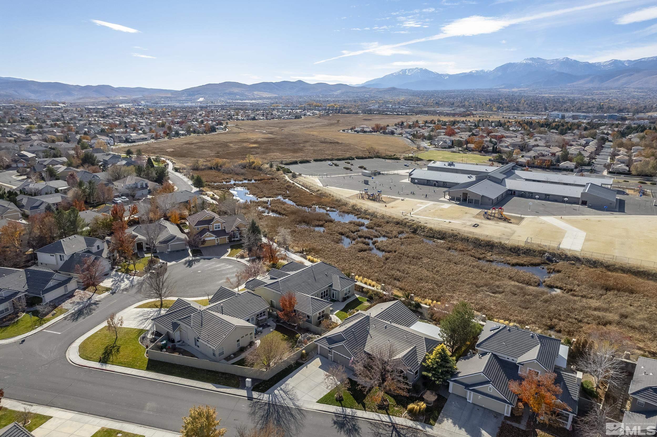 1575 Wyatt Court Reno, NV 89521 - Photo 34 of 40 an aerial view of residential houses with outdoor space