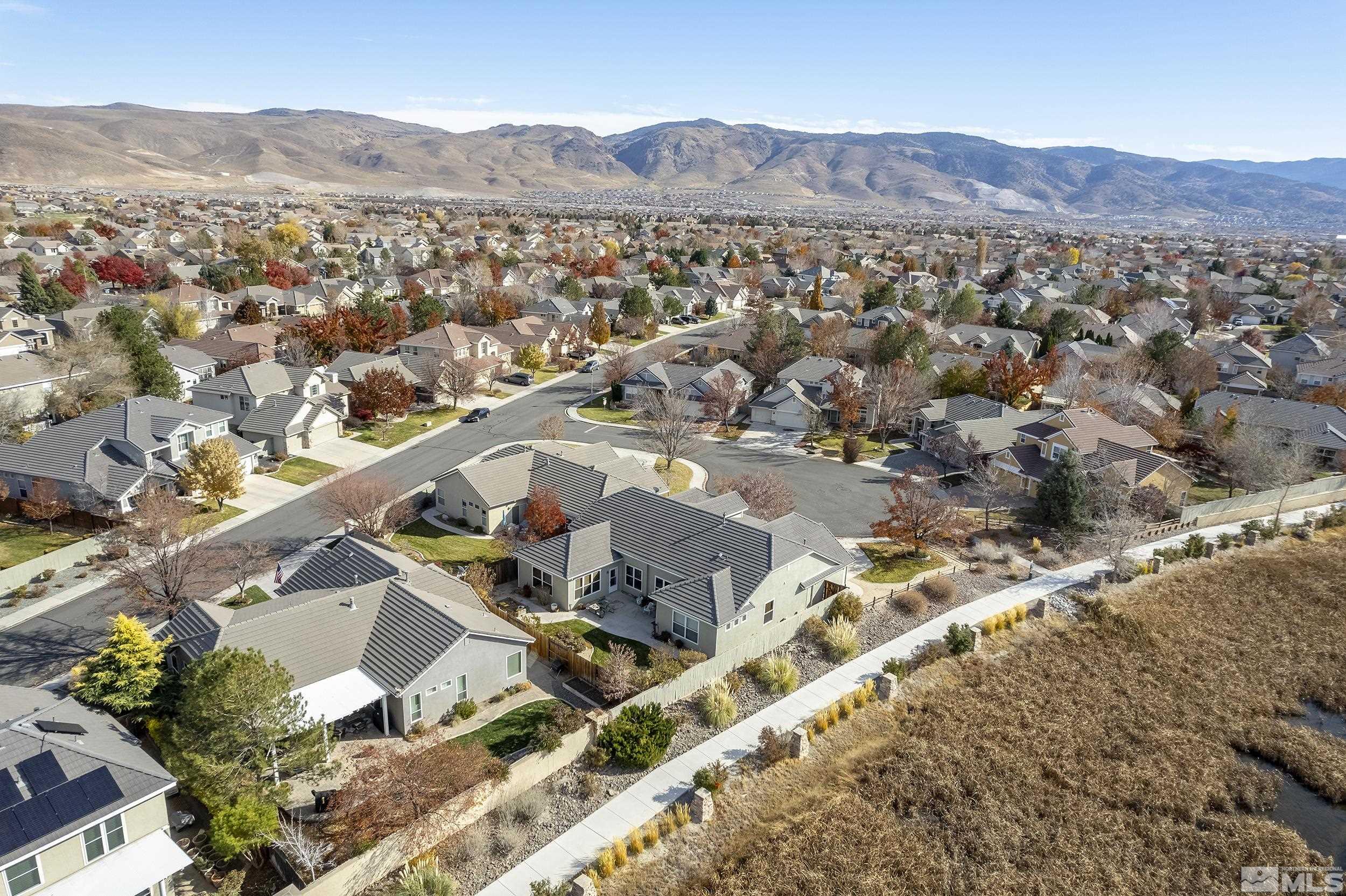1575 Wyatt Court Reno, NV 89521 - Photo 37 of 40 an aerial view of residential house and sandy dunes