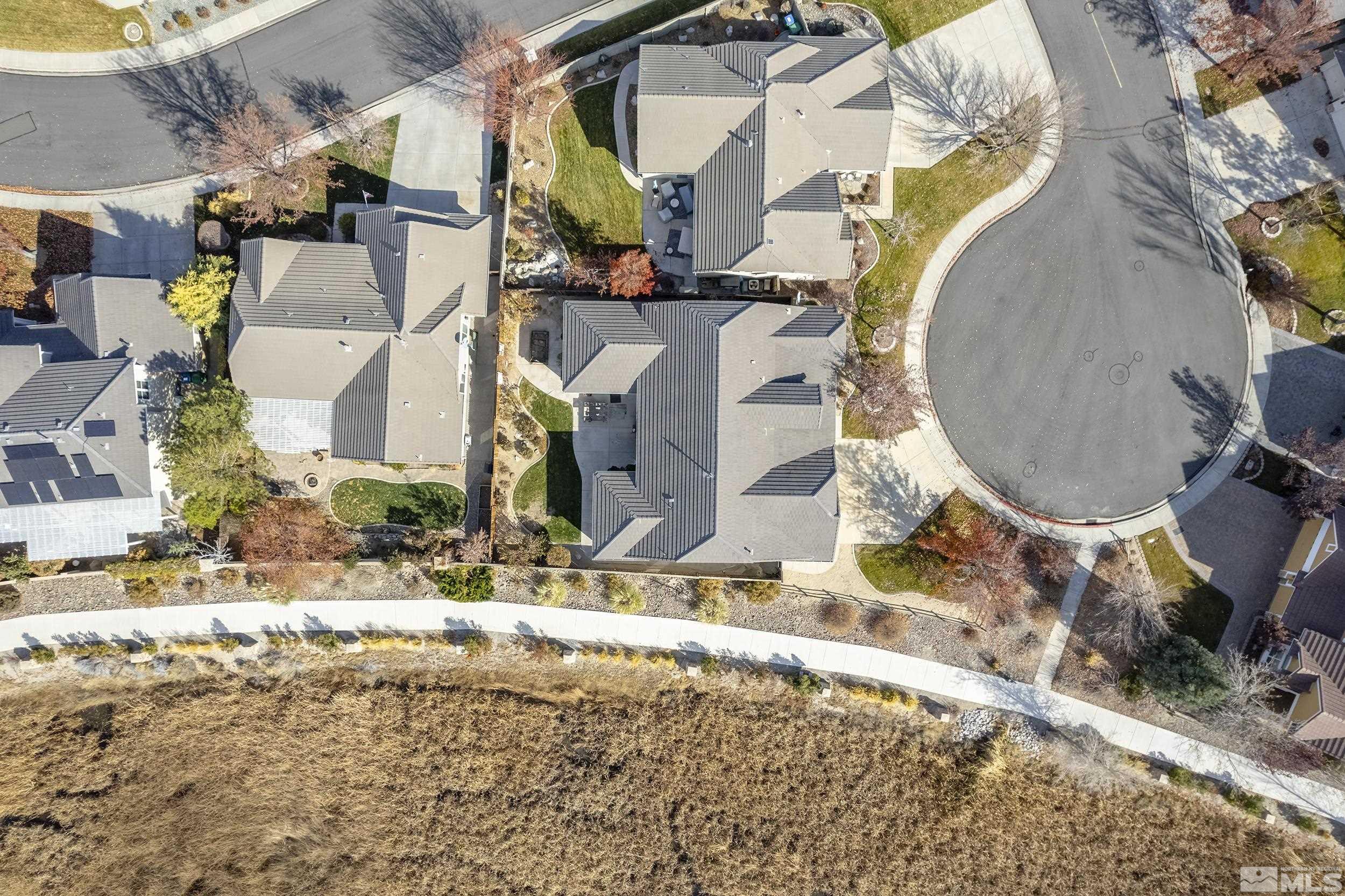 1575 Wyatt Court Reno, NV 89521 - Photo 40 of 40 an aerial view of residential houses with outdoor space