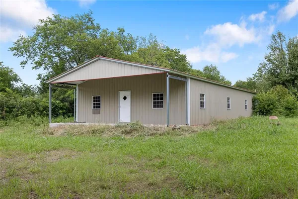 a view of a porch with a furniture