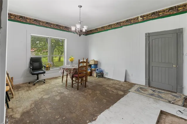 a bathroom with a sink toilet and a mirror
