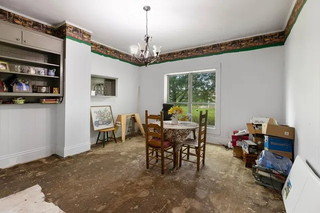 a room with sink and furniture
