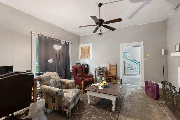 a bedroom with bed and flat tv