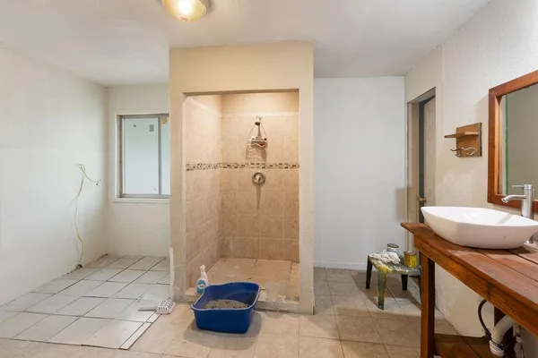 a view of a car park next to a house