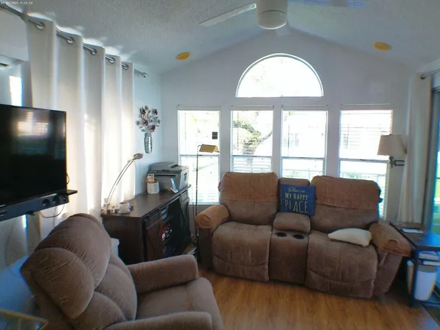 a kitchen with a sink stove and refrigerator