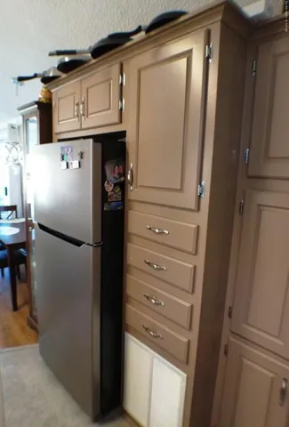 a living room with lots of furniture and a rug