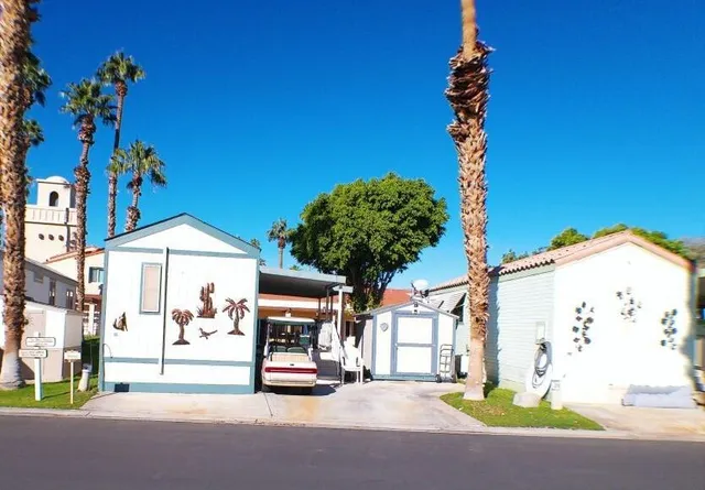 a view of a street with cars