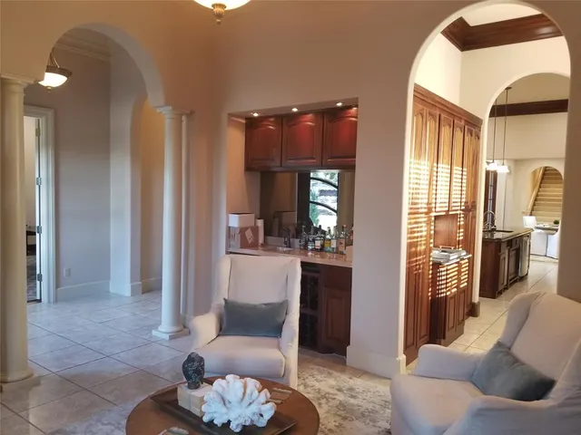 a view of a livingroom with furniture and toys