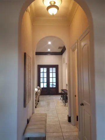 a kitchen with stainless steel appliances granite countertop a sink refrigerator and cabinets